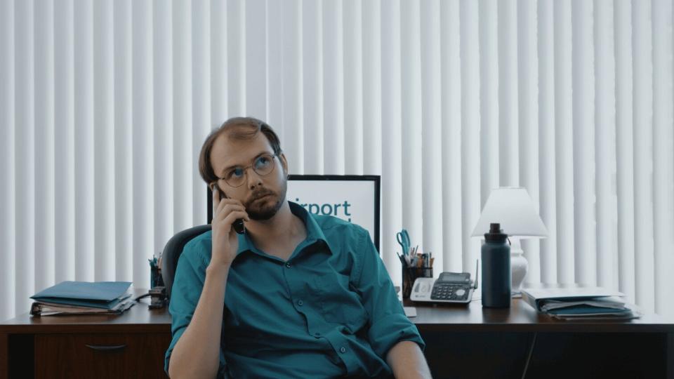 a simple fix - mystic film festival - narrative short - featured image - person on phone