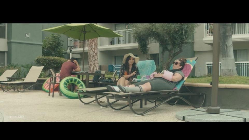 funny thing about grief - mystic film festival - narrative short - featured image - two people lying on beach chairs