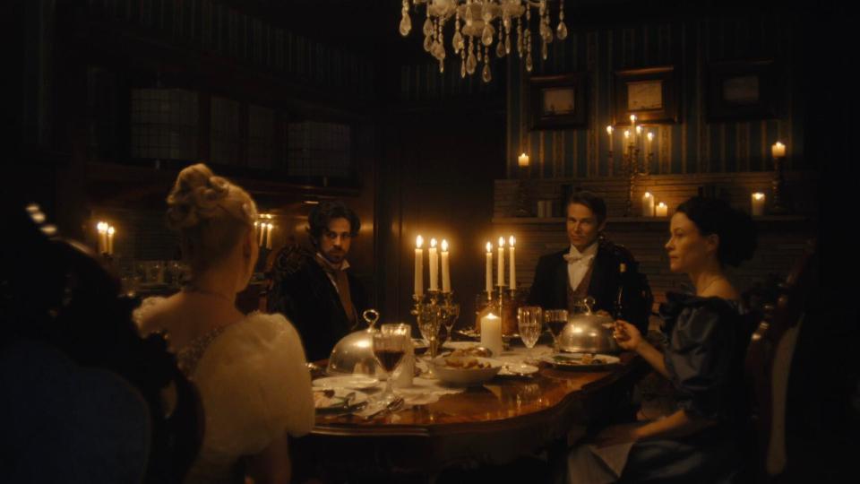 Four characters in the Mystic Film Festival submission "Séance" sit at dinner.