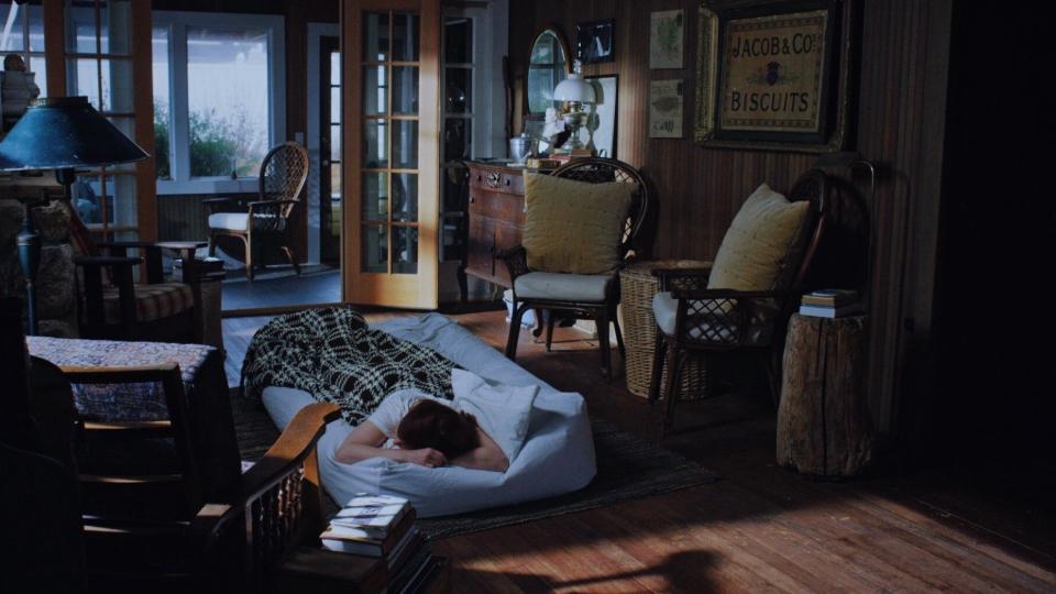 shoulder season - mystic film festival - narrative short - featured image - person sleeping on air mattress