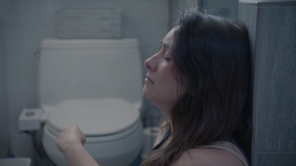 walk away - mystic film festival - narrative short - featured image - person in the bathroom